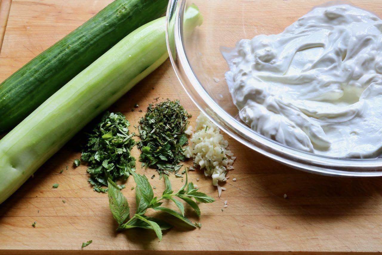 Jajik is a vegetarian side dish featuring yogurt, cucumber, mint, cilantro and garlic.