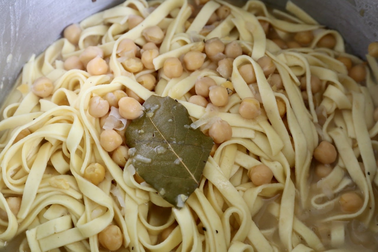 Ciceri e Tria is a vegan Pugliese pasta dish prepared with fettuccine, chickpeas and bay leaf.