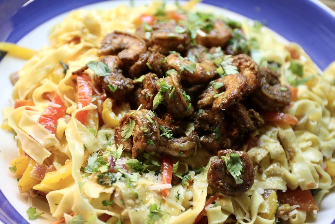 Serve Jerk Shrimp Rasta Pasta at a Caribbean themed dinner party. 