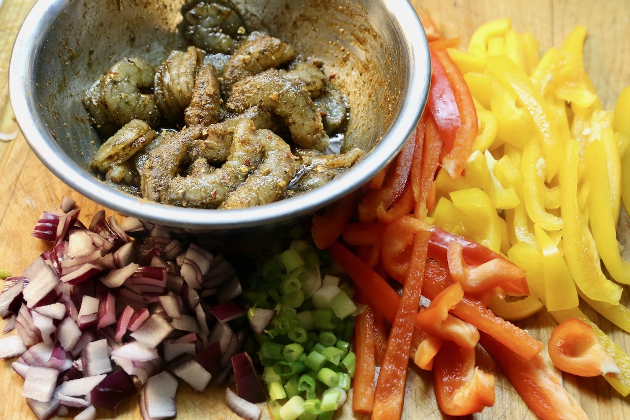 This Shrimp Rasta Pasta recipe features Jerk sauce tossed prawns, onion and sweet bell peppers.