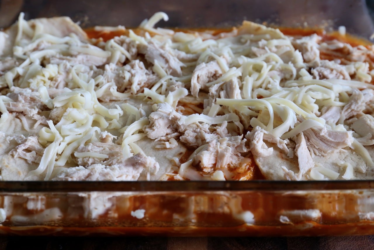 This Mexican casserole is layered with corn tortilla, shredded chicken and cheese.