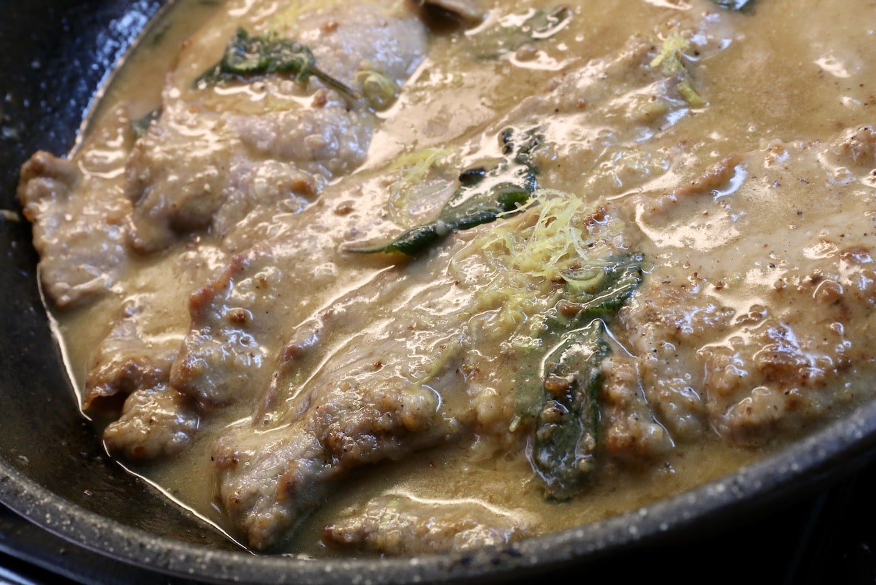 Piccata al Limone features tender veal slices simmered in a creamy lemon butter and wine sauce.