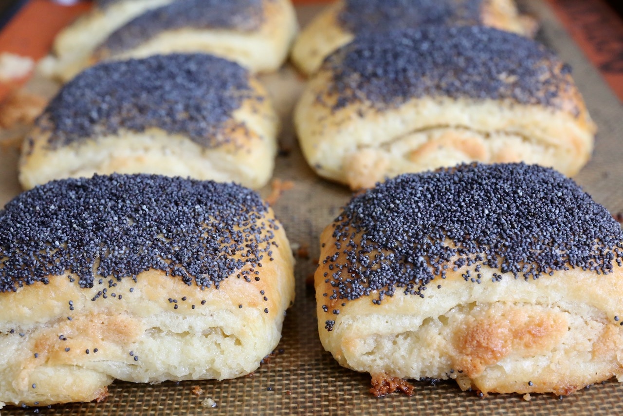 Tebirkes are stuffed with marzipan paste and sprinkled with poppy seeds.