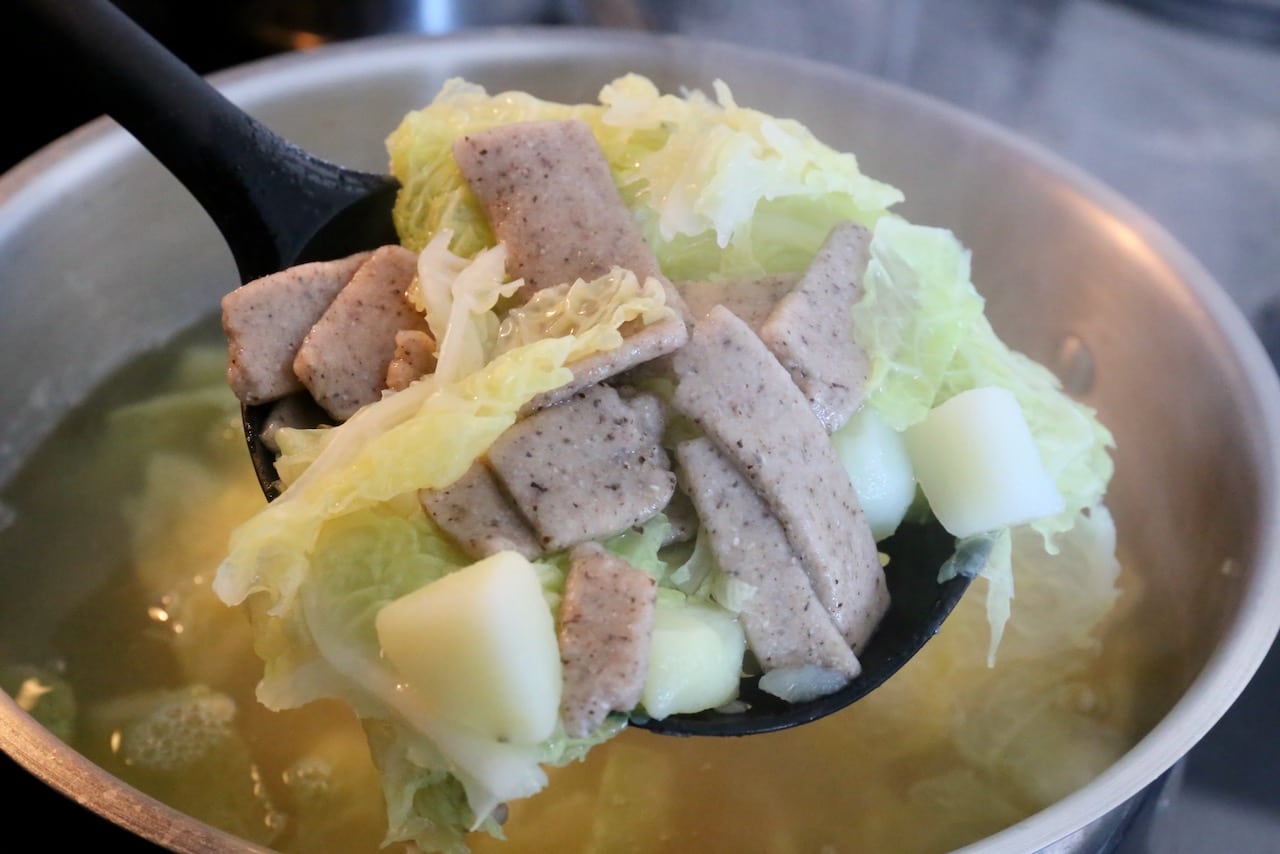 Boil Pizzoccheri pasta with savoy cabbage and diced potato.