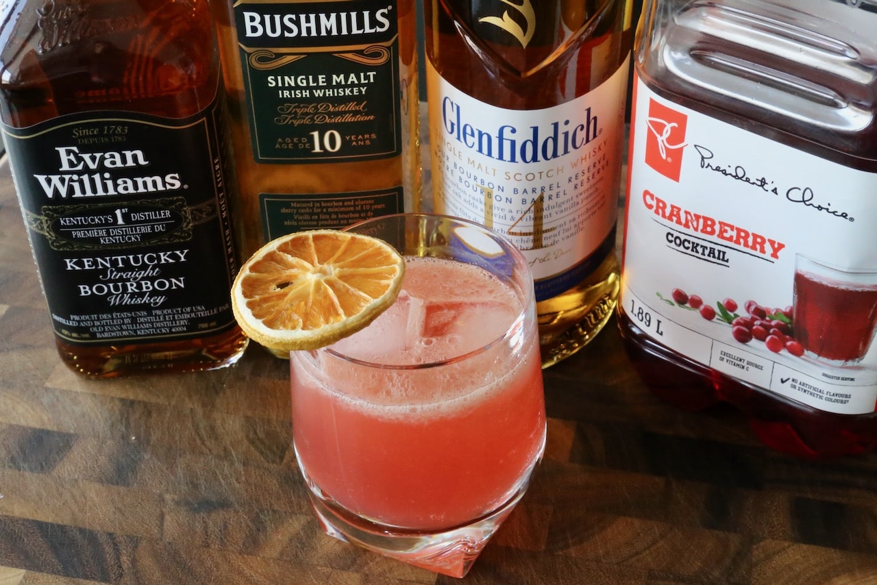 A Cranberry Whisky Sour is the perfect cocktail to serve at a festive Christmas party.
