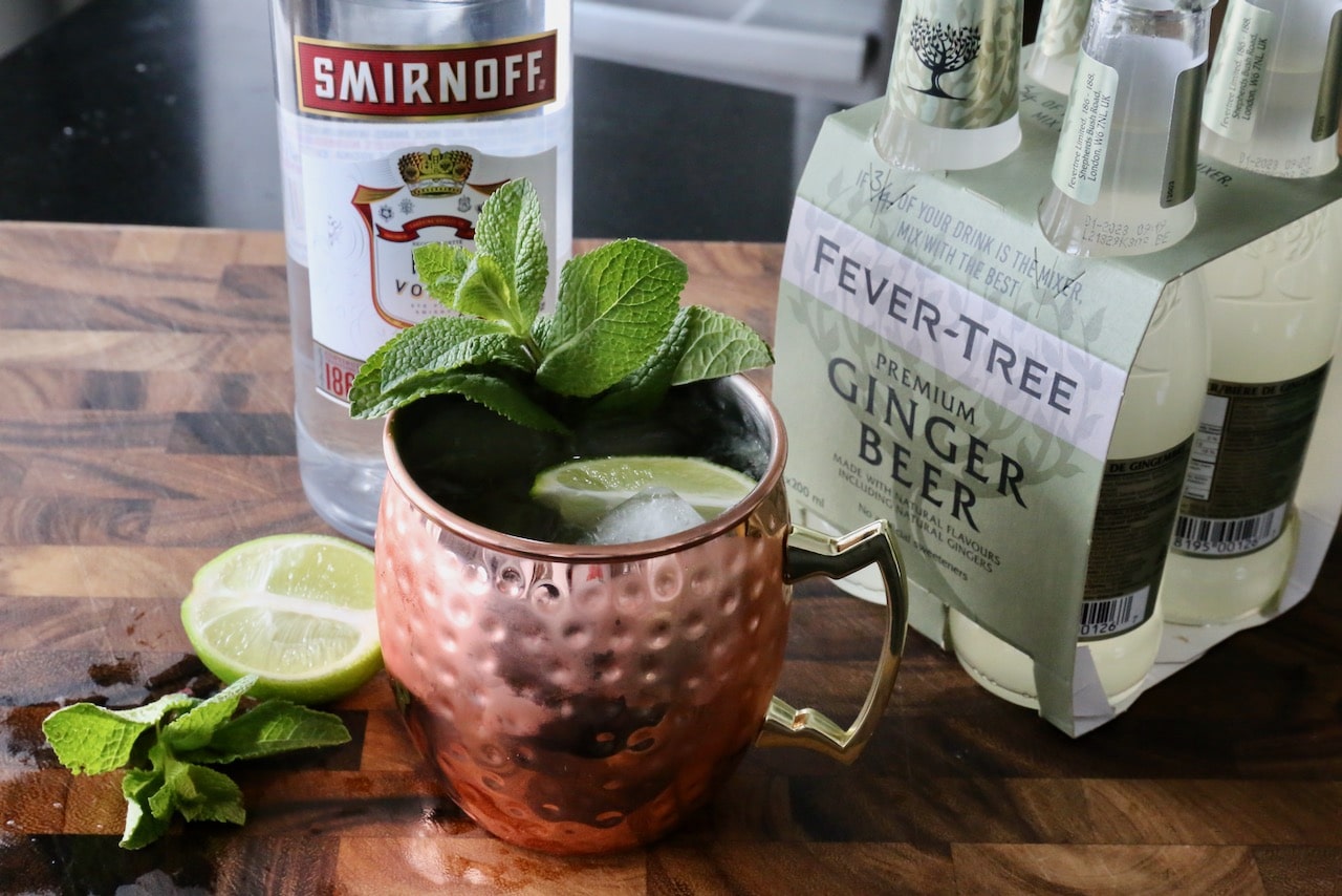 A Smirnoff Moscow Mule is made with vodka, lime, mint and ginger beer.