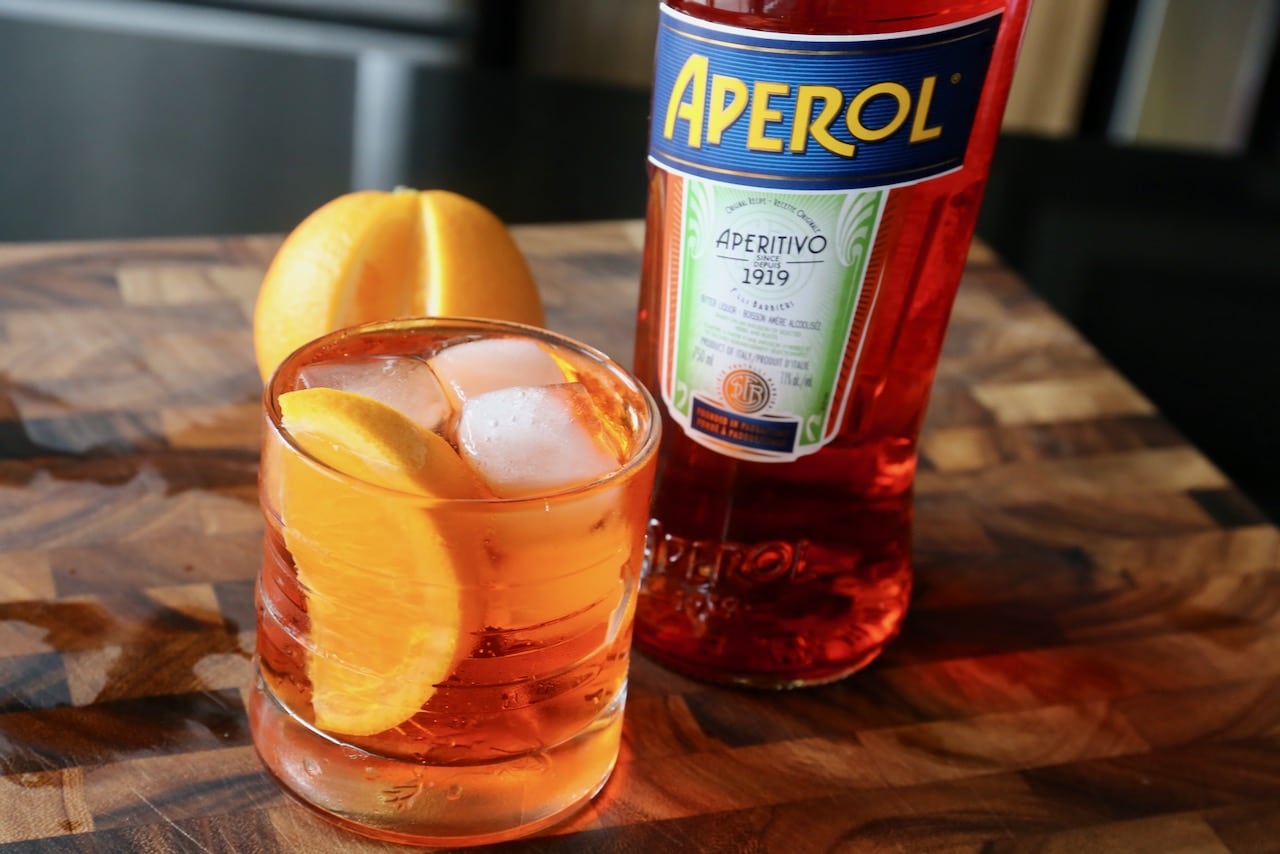 Serve an Aperol Soda in an ice filled rocks glass.