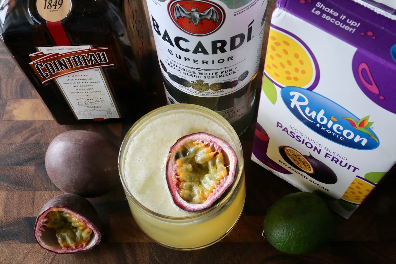 Serve this Passion Fruit Daiquiri garnished with a pretty passion fruit float.