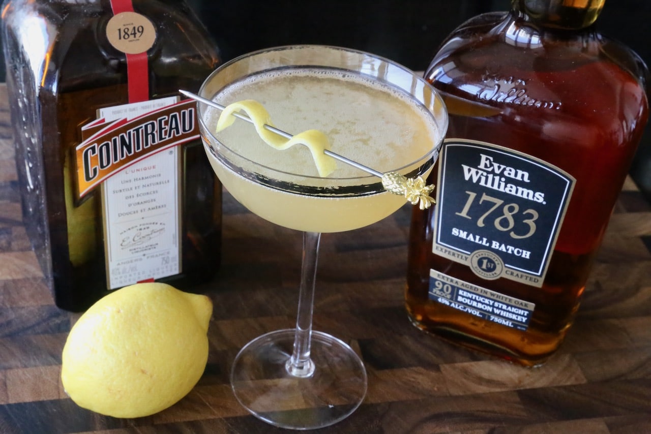 This whisky cocktail features bourbon, orange liqueur, fresh lemon juice and simple syrup.
