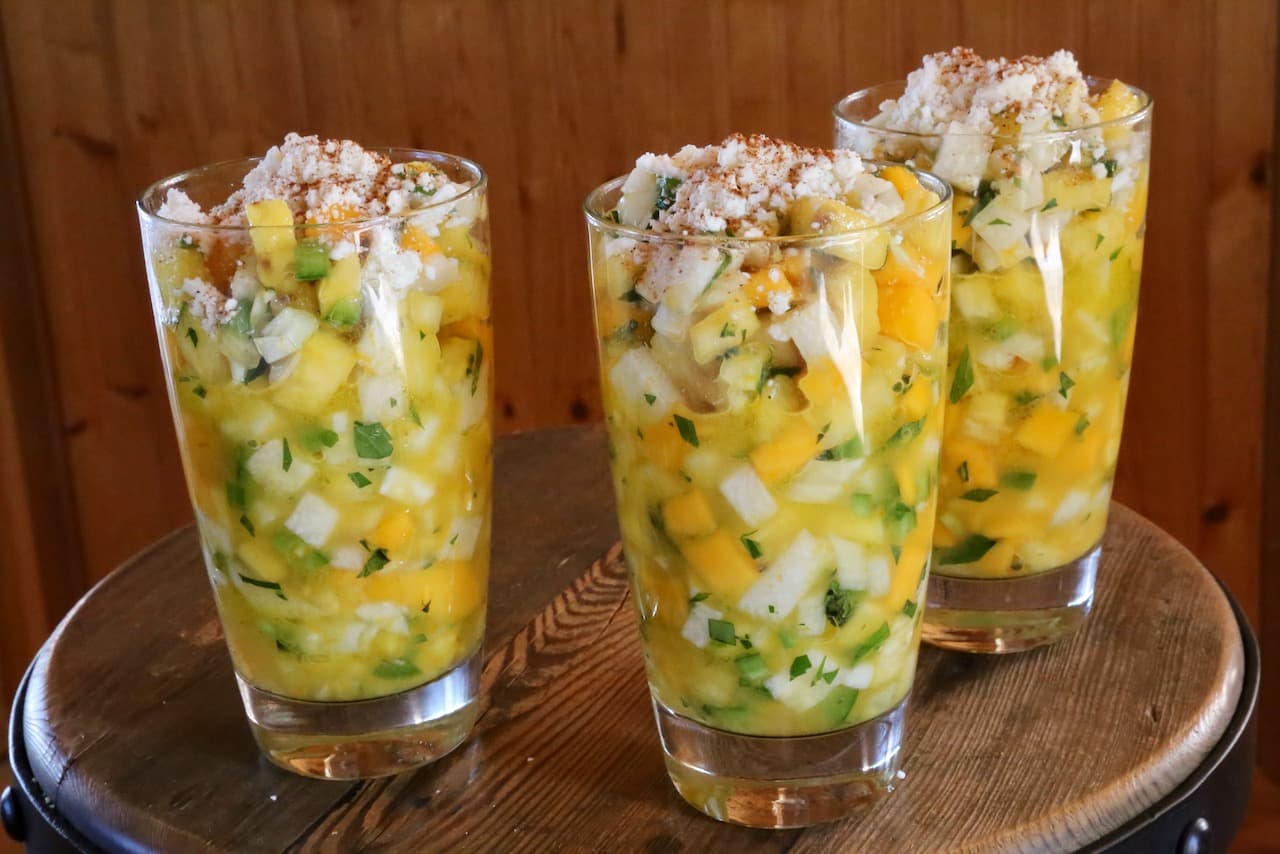 Serve Gazpacho Moreliano sprinkled with crumbled feta cheese and dash of chili powder.