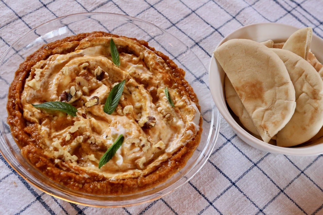 Serve this homemade Kashke Bademjan recipe with freshly baked pita bread.