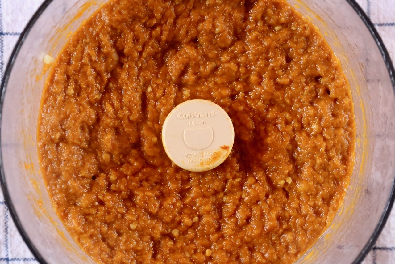 Prepare Kashke Bademjan in a food processor.