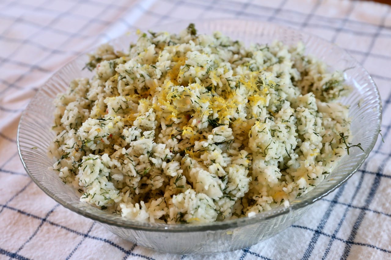 Serve the rice in a shallow bowl garnished with lemon zest.