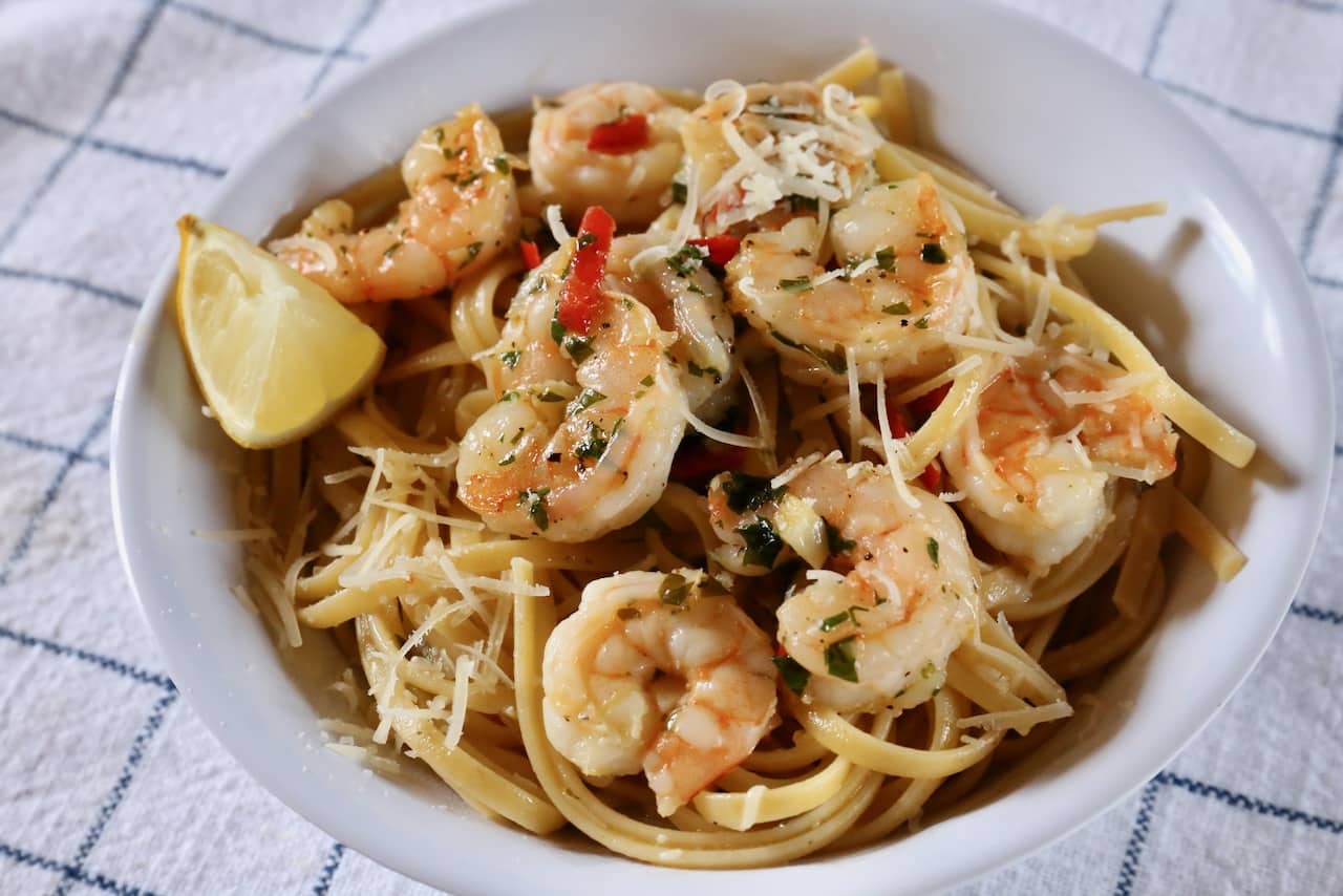 Serve Prawn and Chilli Pasta with a lemon wedge. 