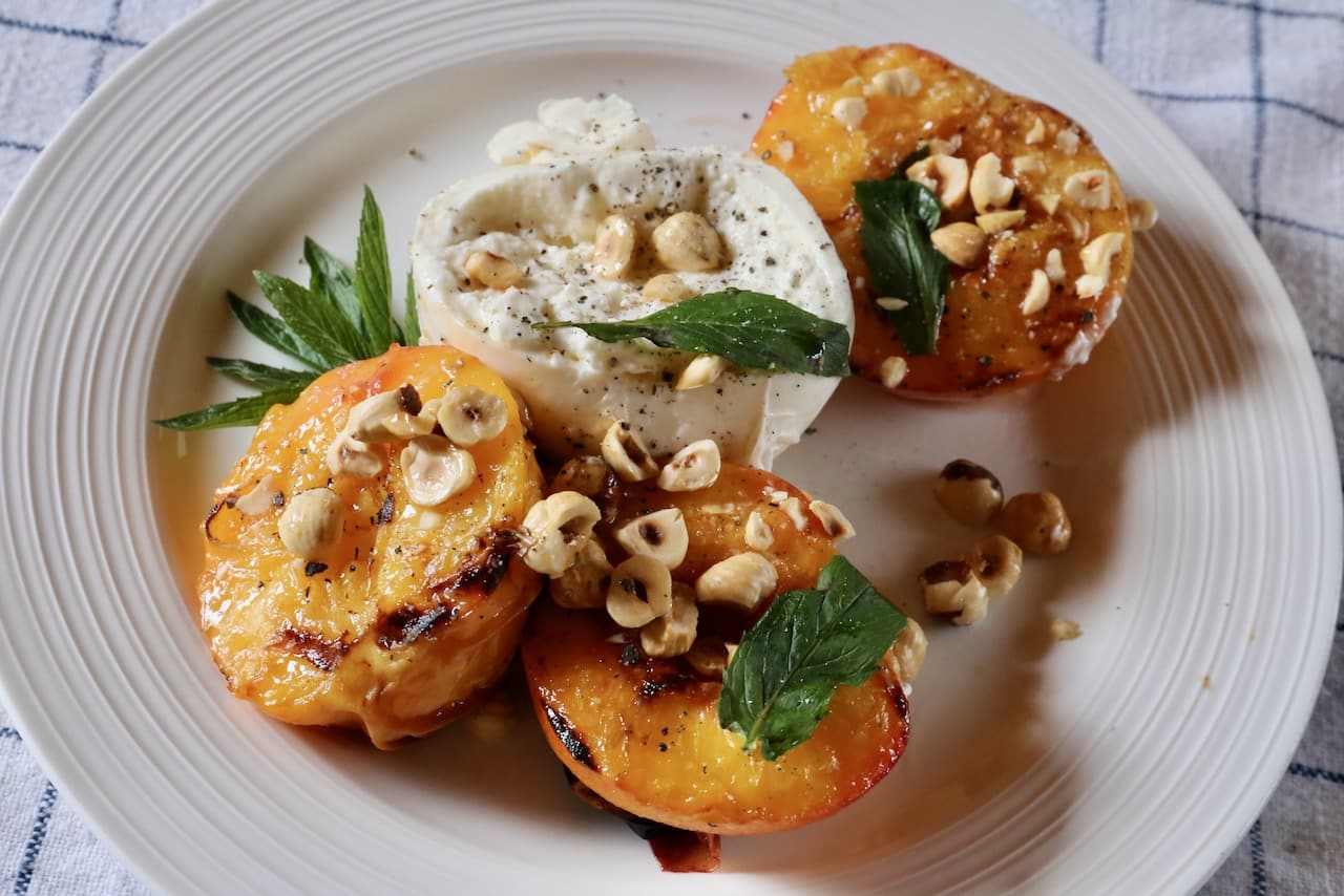 We love serving Grilled Peach and Burrata Salad as a side dish with barbecued seafood and steak.
