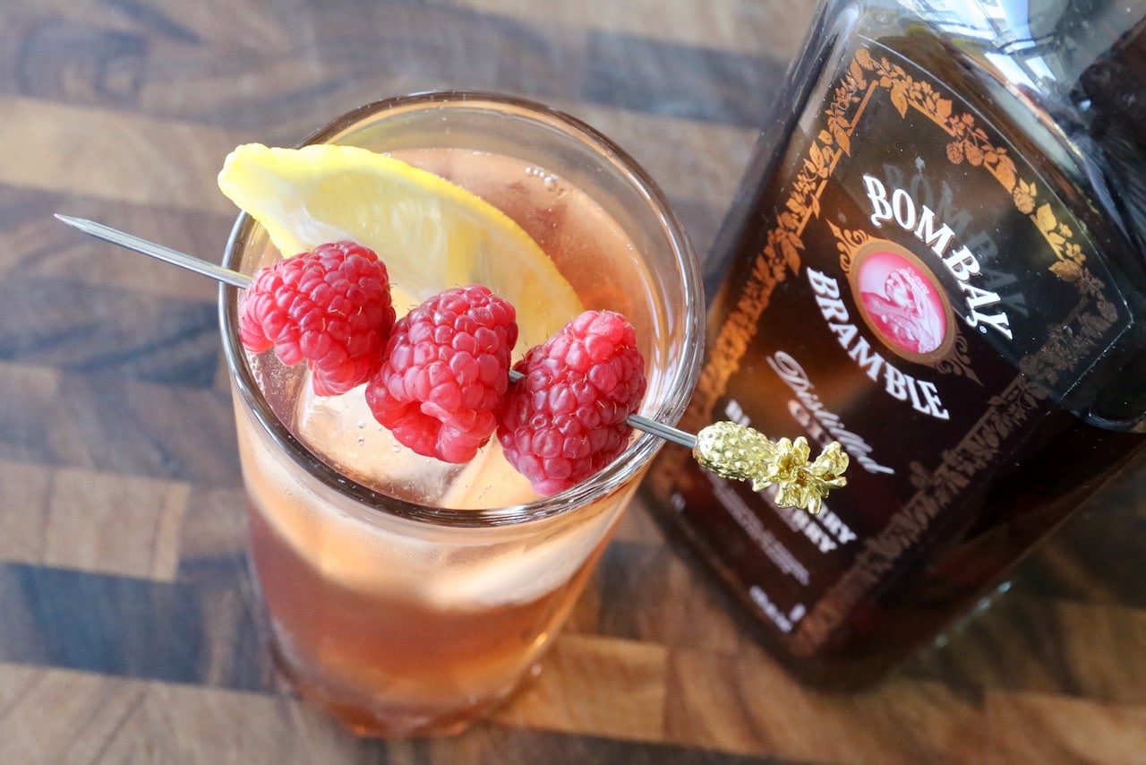 Top the drink with a lemon wedge so you can spritz the cocktail with fresh citrus.