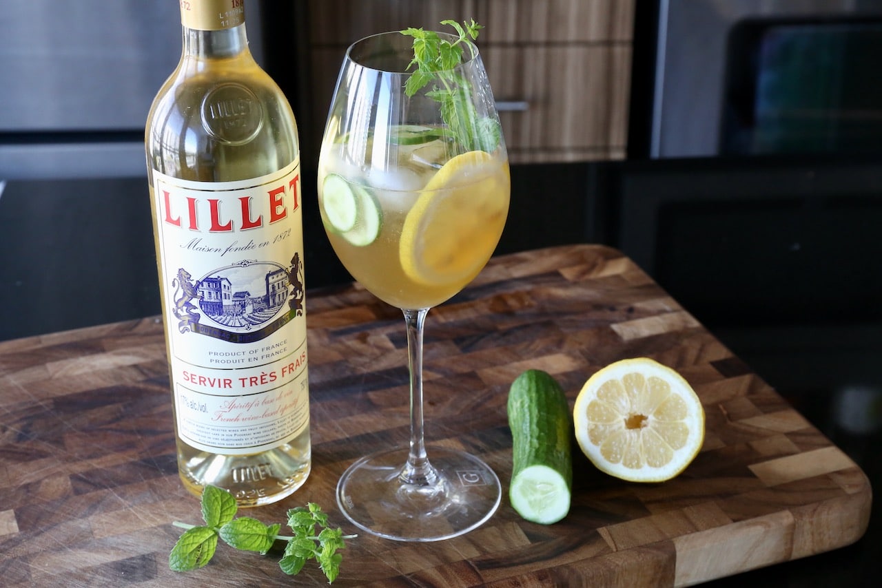 Serve a Lillet Blanc Spritz in a wine glass.