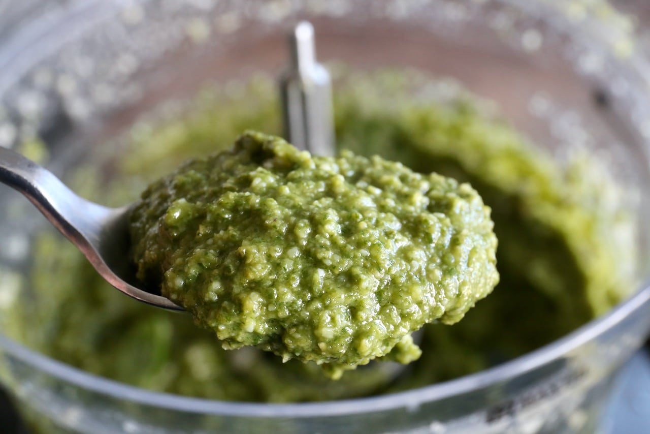 Prepare homemade pesto in a food processor.  