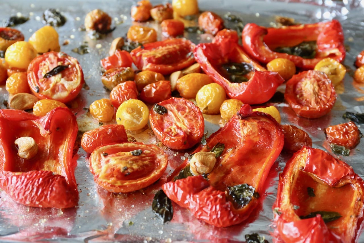 Bake tomatoes and peppers in the oven until tender. 