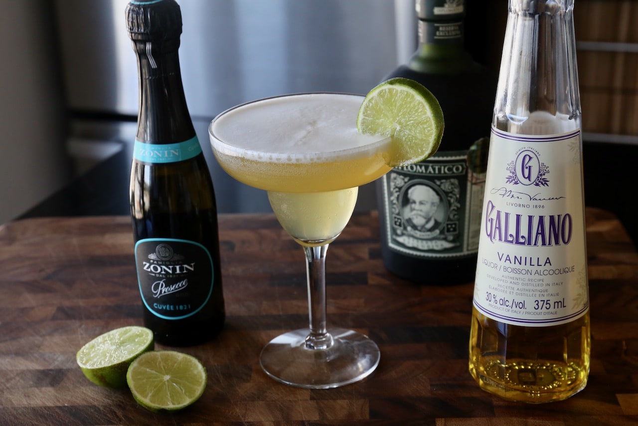 Garnish the glass with a lime wheel.