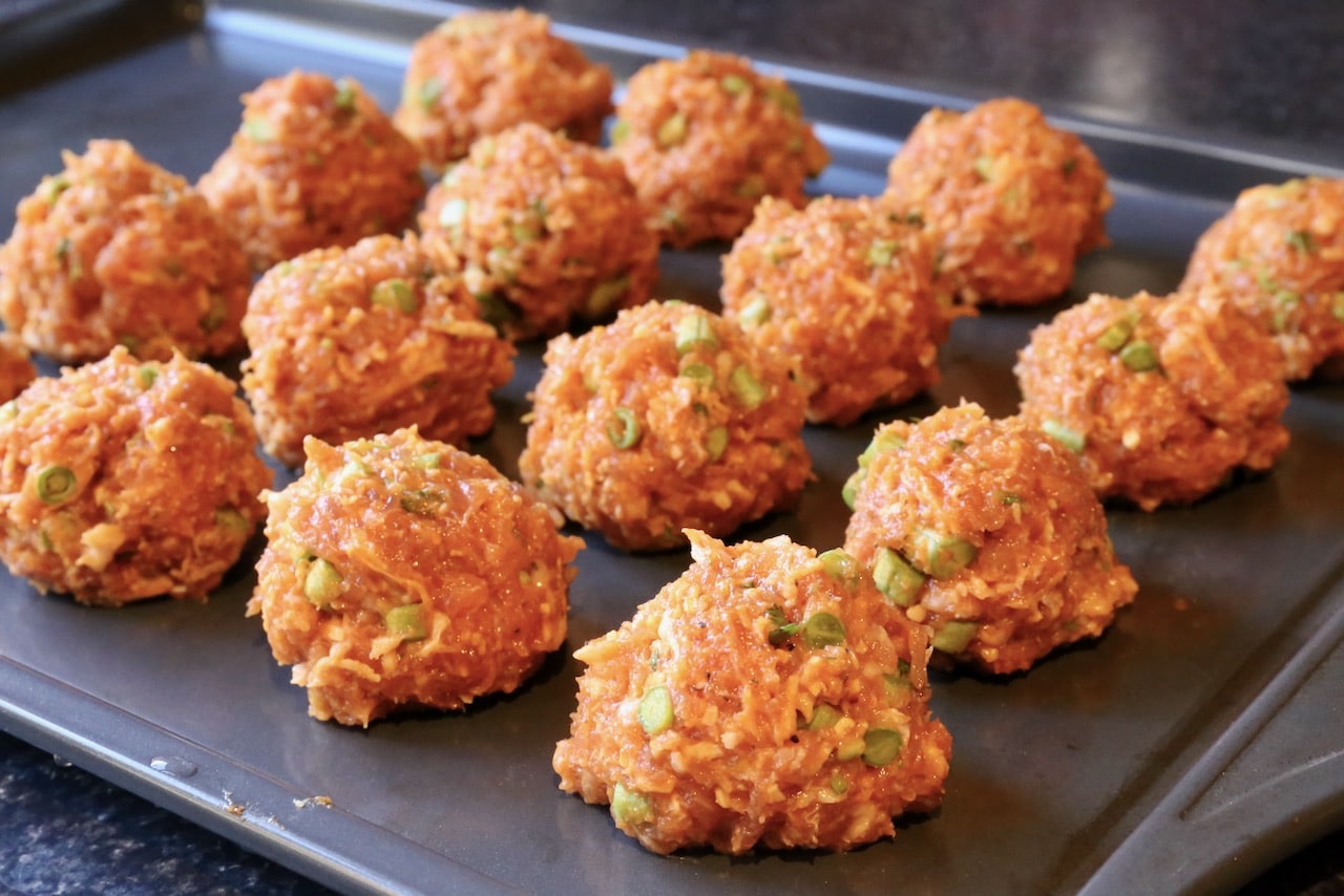 Form meatballs using wet hands to prevent sticking.
