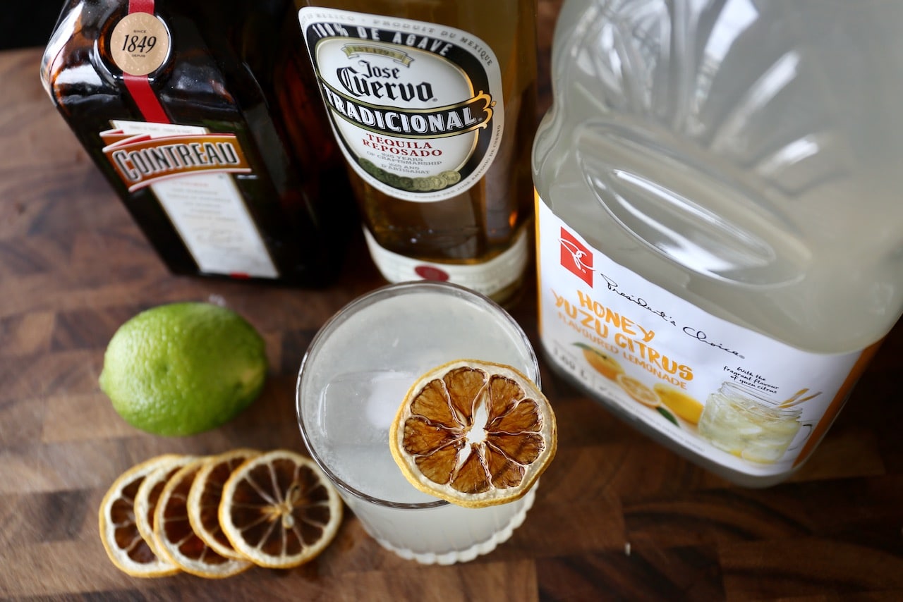 Garnish the glass with a dehydrated lime wheel.