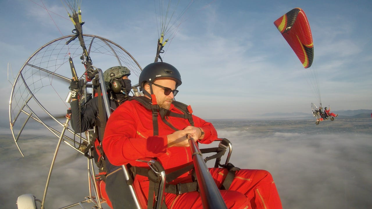 Take to the skies on a thrilling paramotor ride, which flies over rural Chiang Mai. 