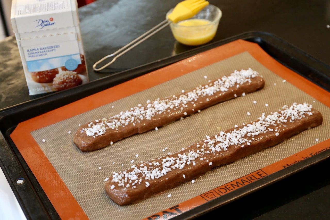 This Swedish chocolate cookie slice recipe is topped with pearl sugar before baking.