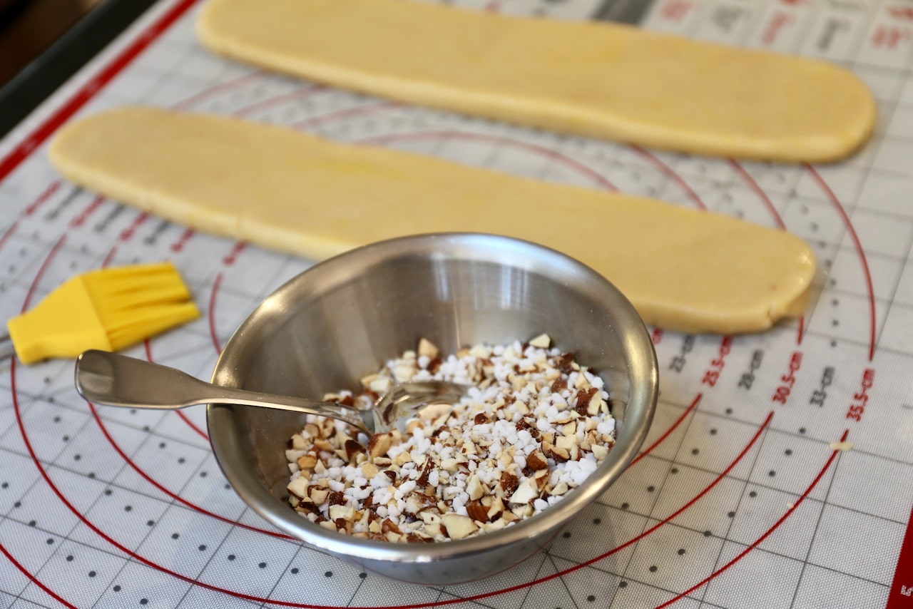 This Swedish shortbread cookie recipe is topped with chopped almonds and pearl sugar. 