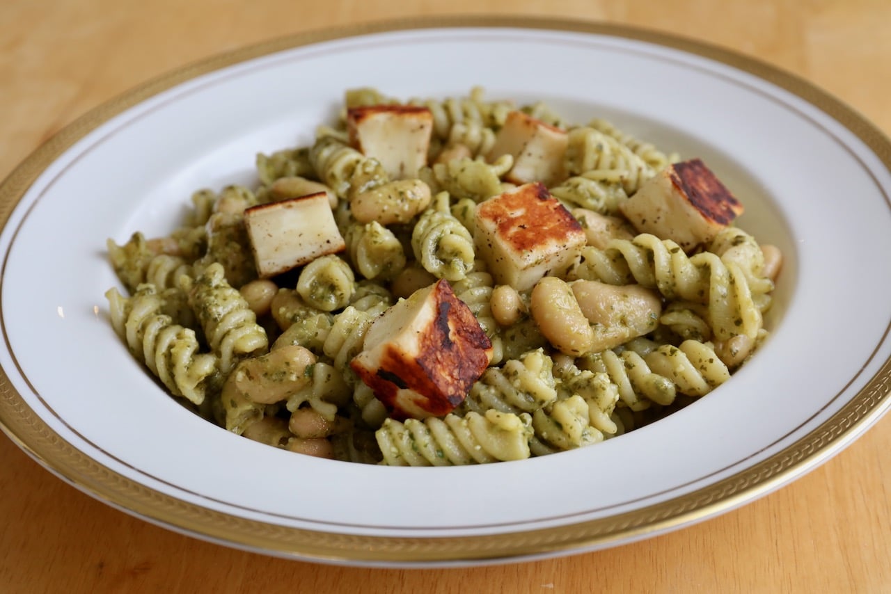 Toss rocket pesto with al dente pasta then topped with crispy fried halloumi cheese.