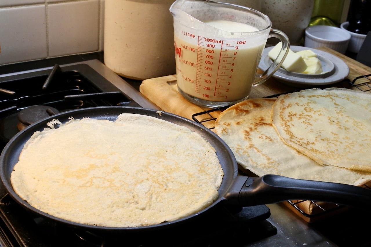 Cook Hungarian pancakes in a crepe pan and let cool on a rack before assembling Hortobagyi Palacsinta.