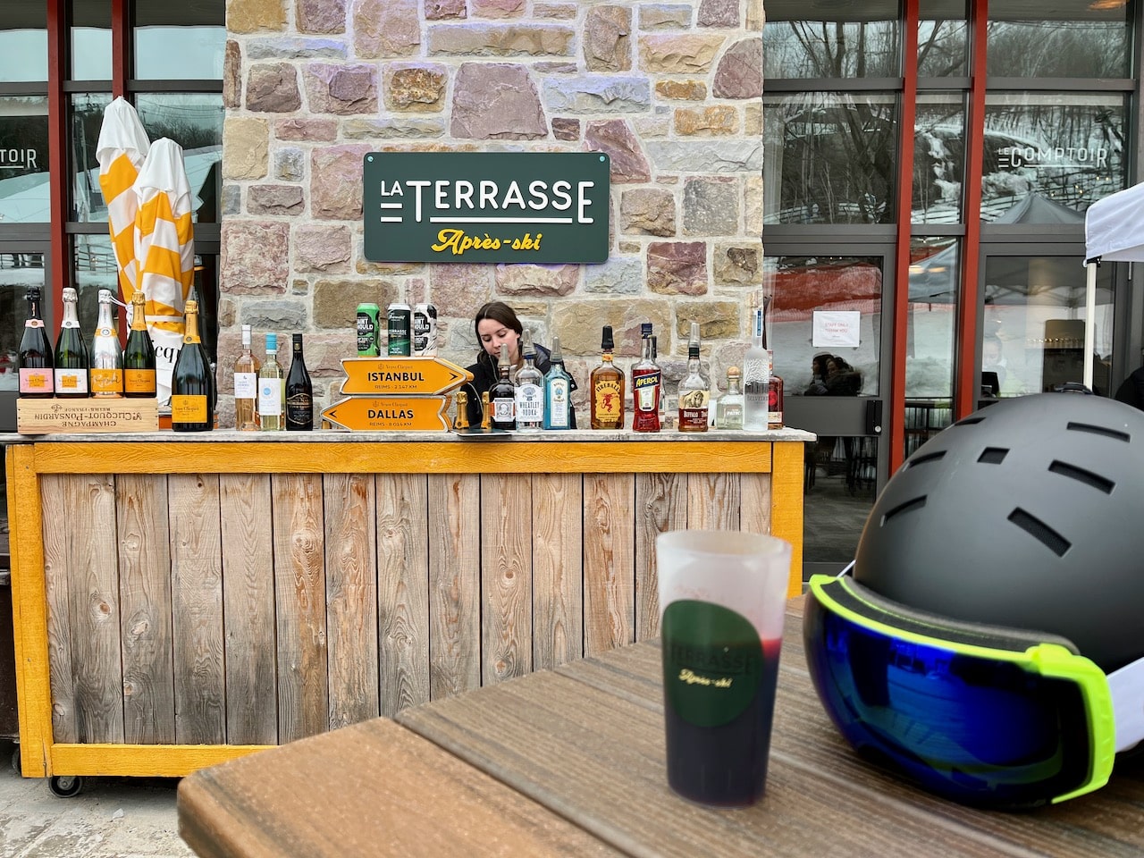Wrap yourself in a faux-fur blanket at La Terrasse, sip on some mulled wine, and gaze at the skiers whizzing by.