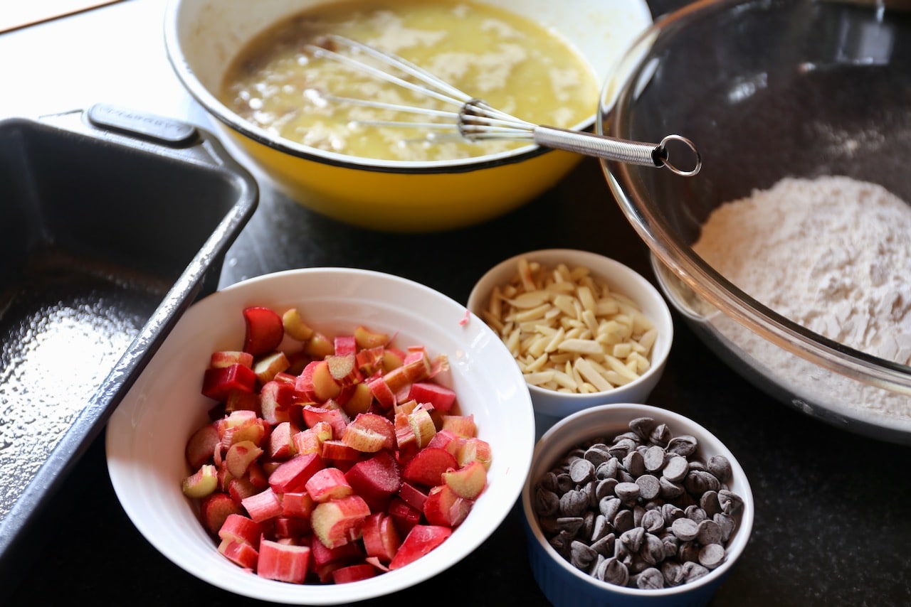 This comforting sweet bread recipe features ripe bananas, rhubarb, almonds, and chocolate chips.