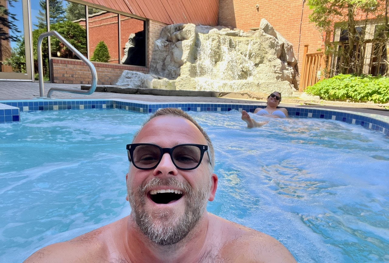 Relax in an outdoor hot tub at The Water Tower Inn in Sault Ste Marie. 