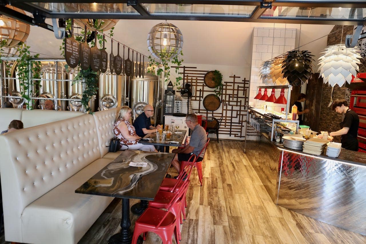 Craft beer tanks line the walls of the dining room at The Grist in Niagara on the Lake.