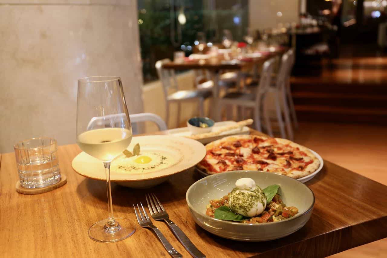 Prego is an Italian restaurant serving fine wine, pizza, pasta, and risotto.