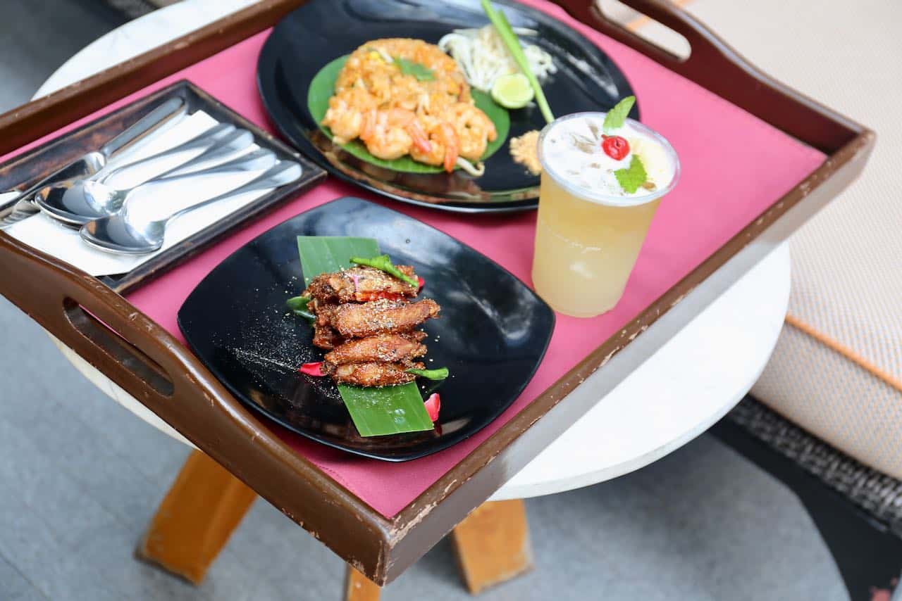 Enjoy an al fresco feast at the Hyatt Regency Bangkok Hotel pool featuring popular menu items from the Market Cafe menu.