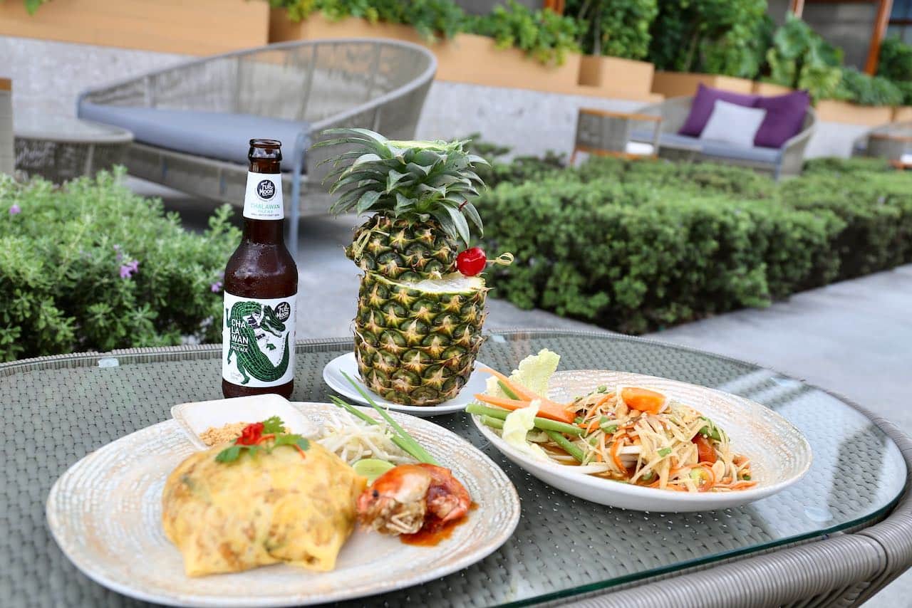 Enjoy a poolside sip and snack at The Beach.