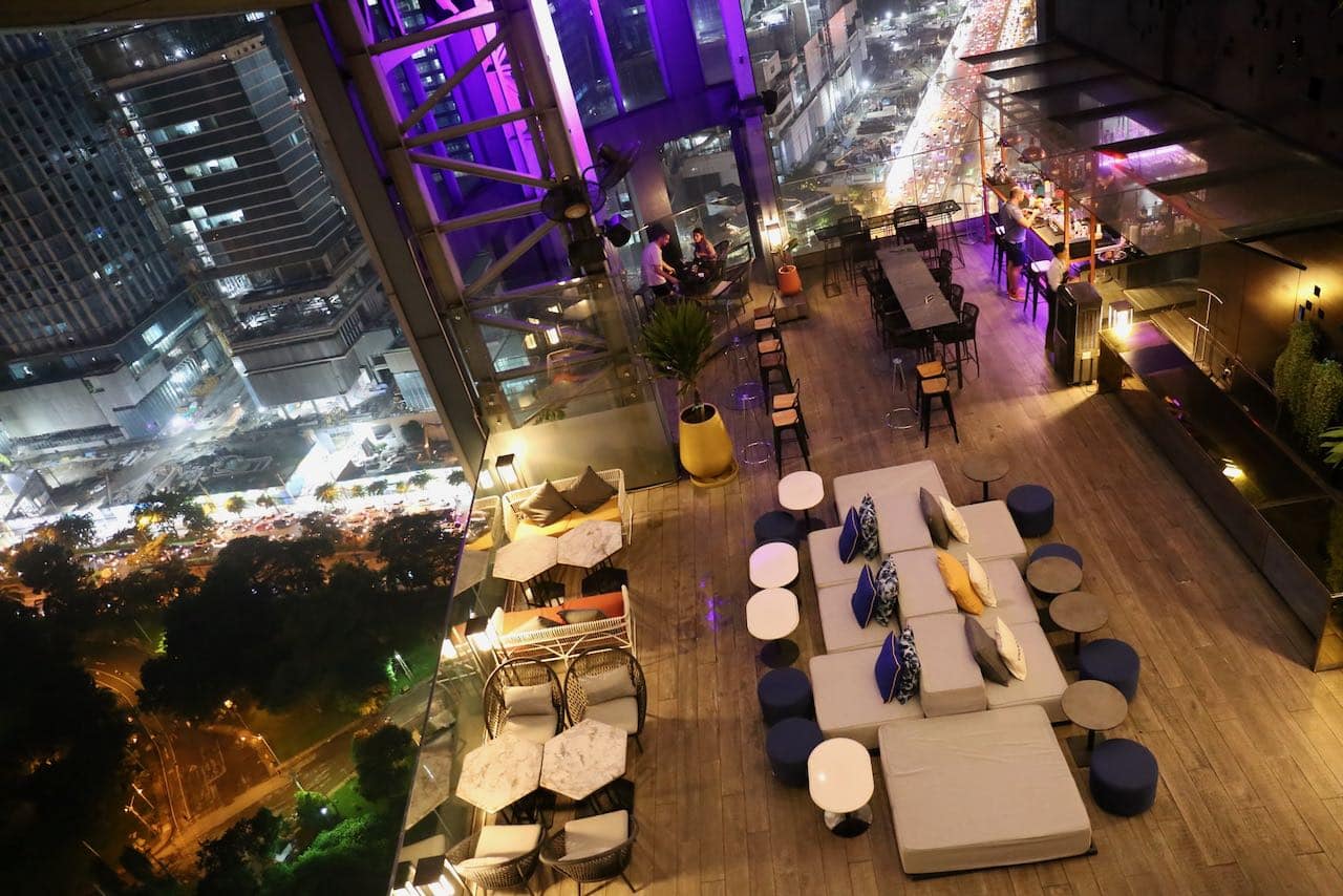 Sip craft cocktails at sunset overlooking Lumphini Park at SO/ Bangkok's 29th floor Hi-So. 