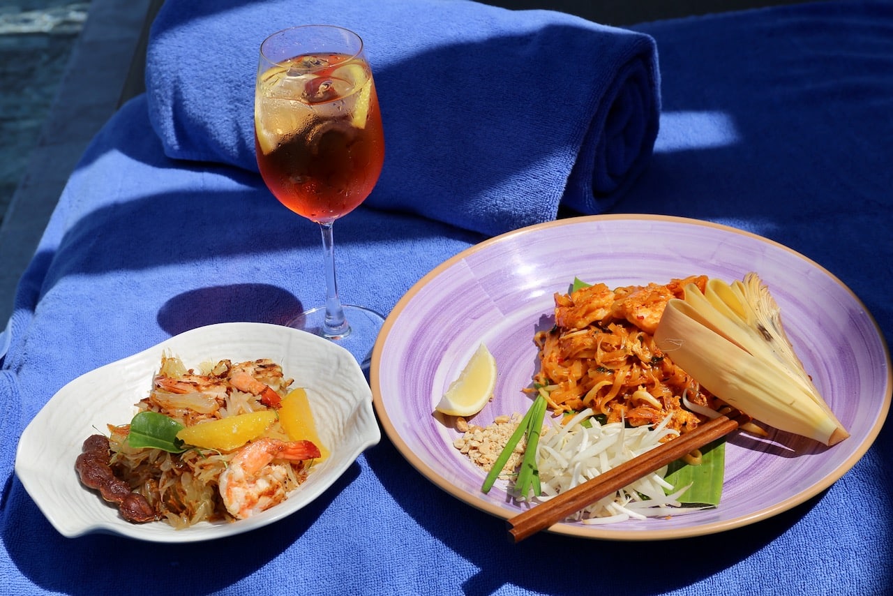 Taste authentic dishes from Southern Thailand at the Aleenta Phuket Resort pool or beach.