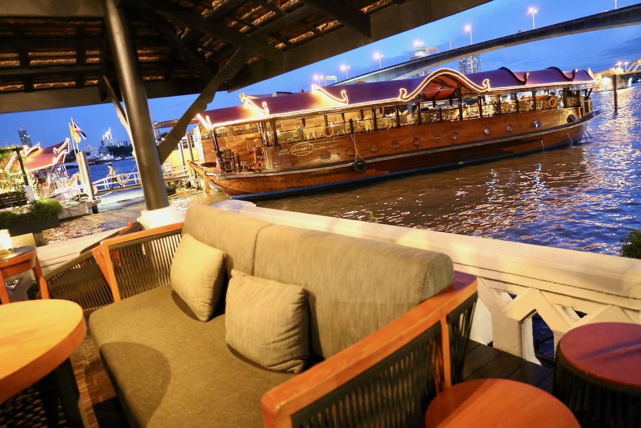 Guests enjoy canapés in an al fresco lounge before boarding the Manohra Dinner Cruise.