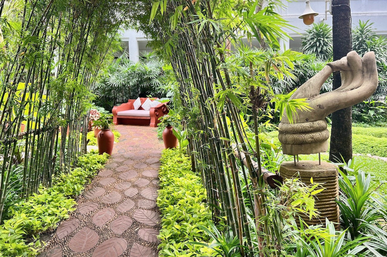 An inviting garden leads to the tranquil Anantara Spa.