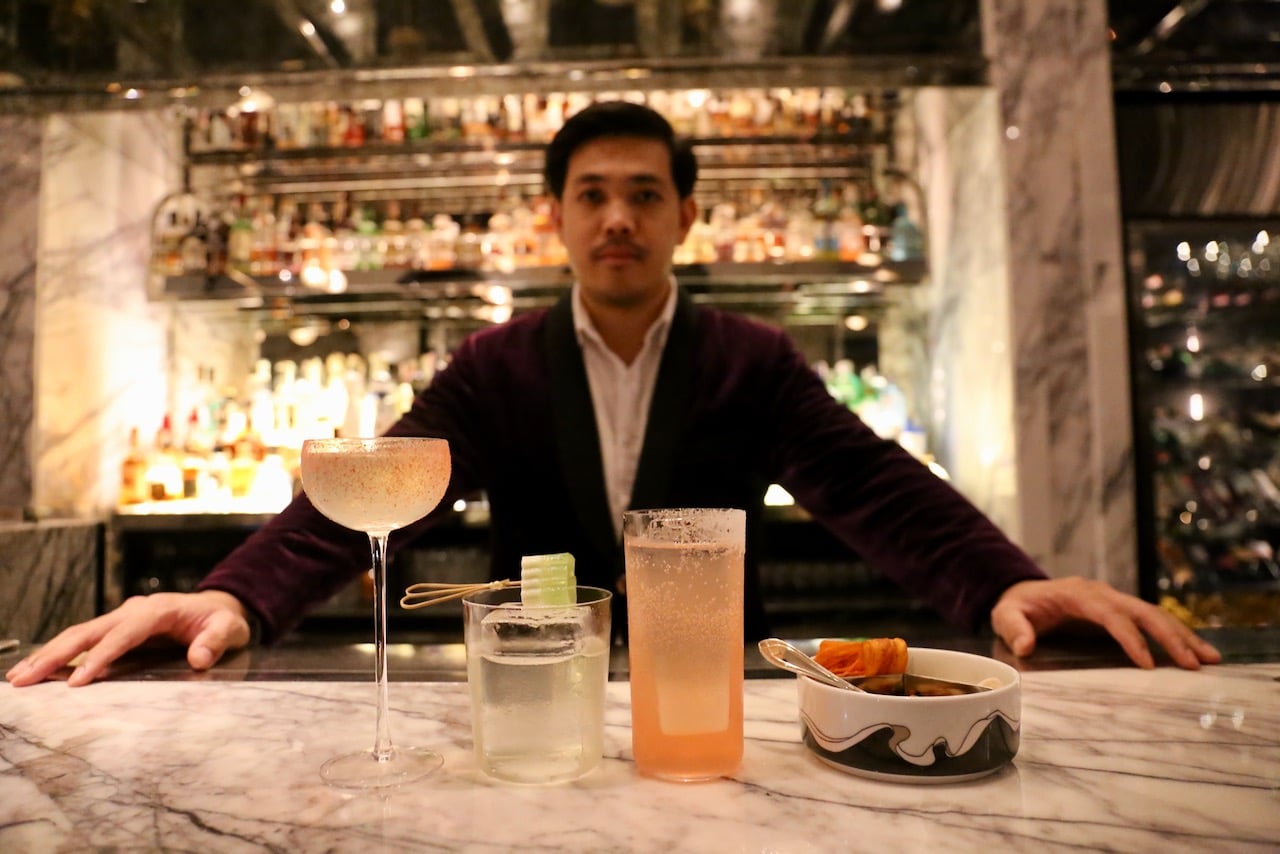 Hop up at the white marble bar at Stella and chat with bartenders as they mix and muddle craft cocktails.