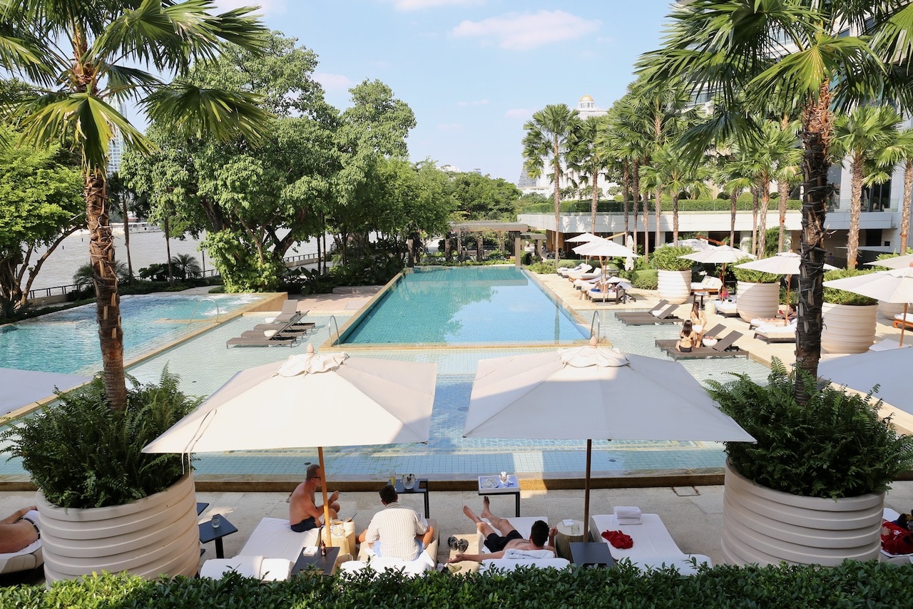 Overlooking the Four Seasons Bangkok Pool from the outdoor patio at Riva Del Fiume Ristorante.