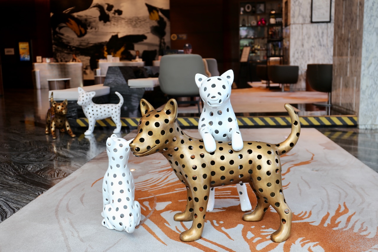 Cute dog sculptures adorn the lobby at Le Méridien Bangkok Hotel.