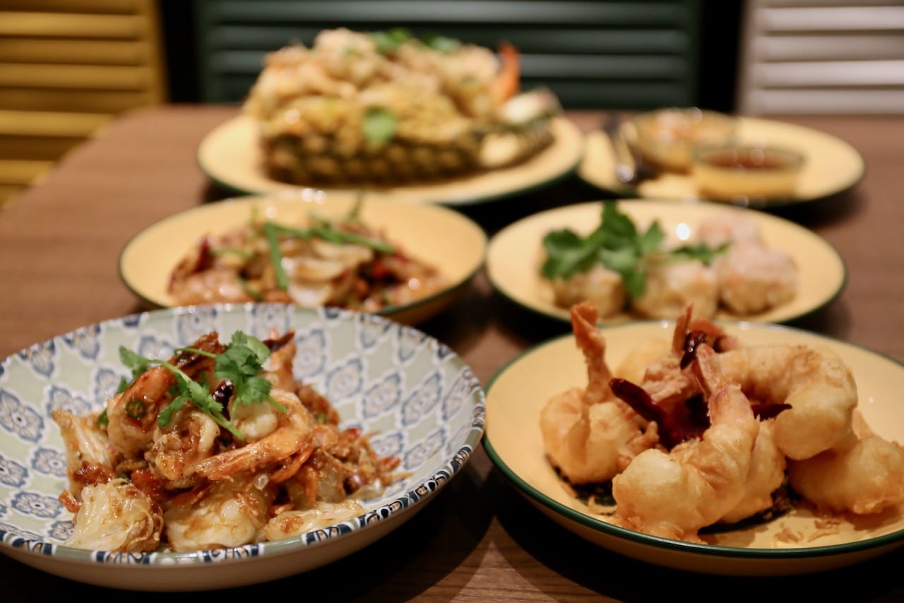 Taste authentic Thai dishes at dinner in the Bangkok'78 dining room.