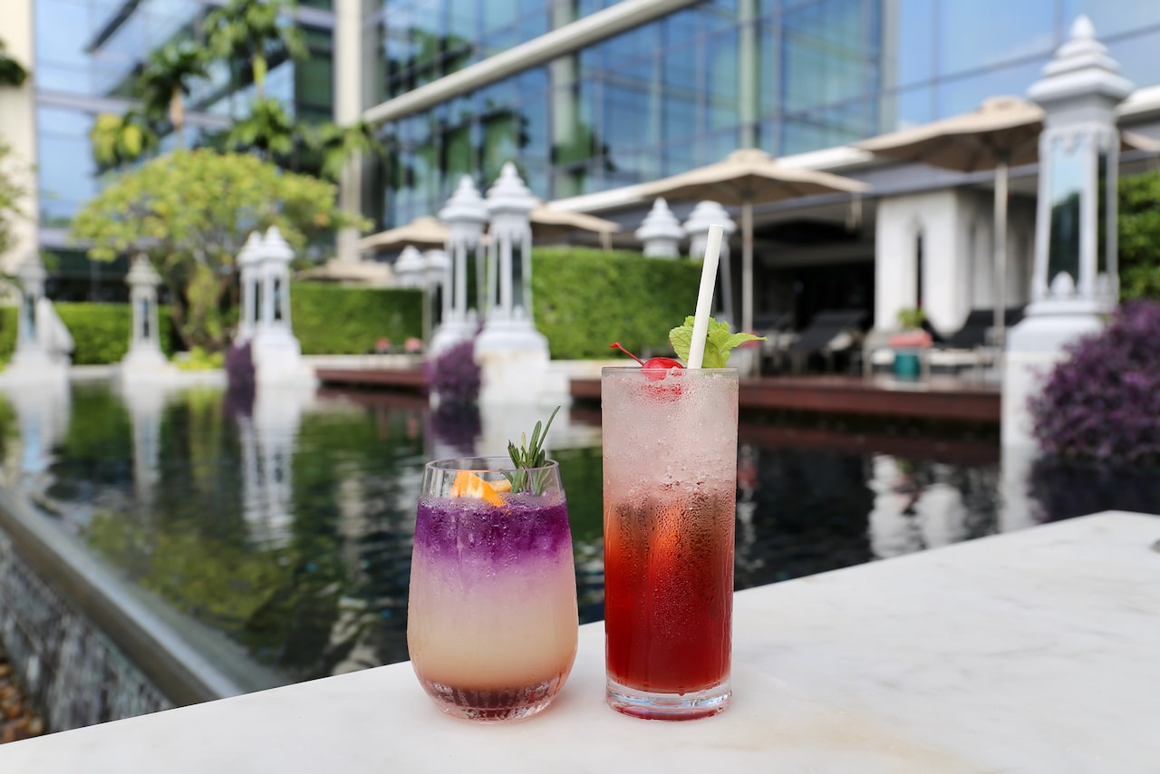 Sip craft cocktails at the St. Regis Pool Bar.