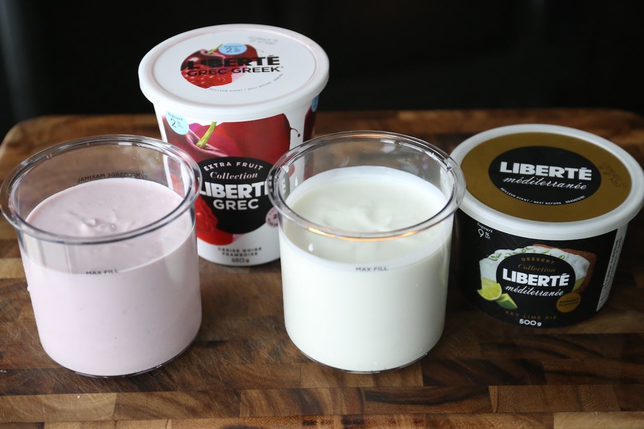 Add stirred milk and yogurt to the max fill line of your tubs before freezing for 24 hours.