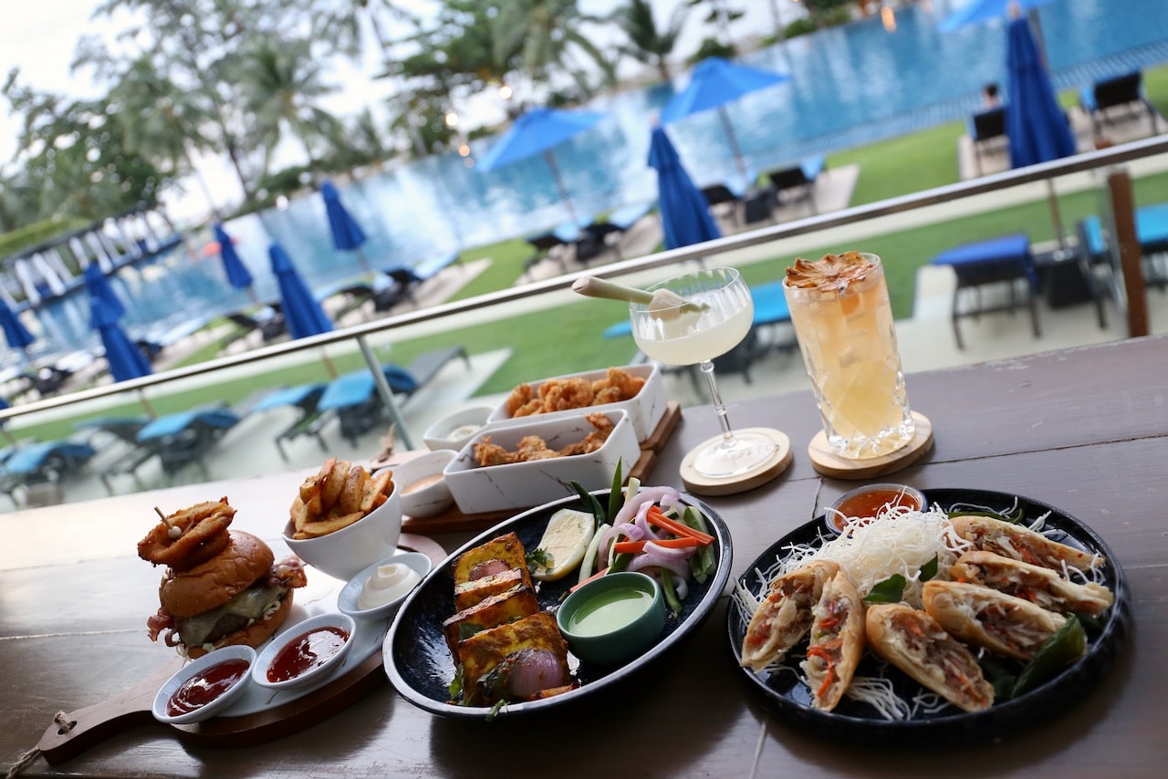 Enjoy burgers, spring rolls and crispy fried avocado fries at ONE80° Pool Bar.