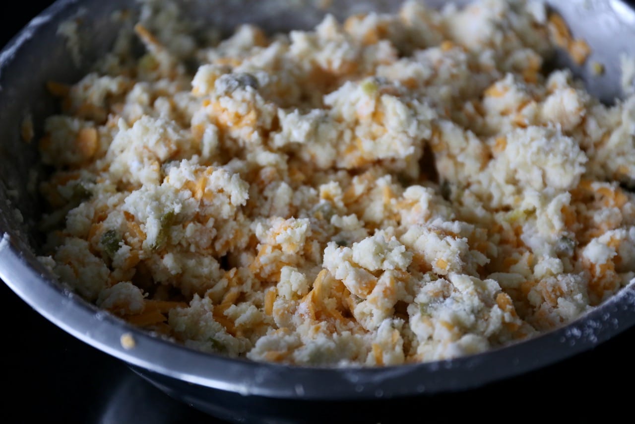 Combine cheese puff ingredients in a large mixing bowl until well combined.
